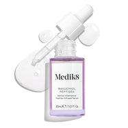 Fioletowa szklana buteleczka z serum „Bakuchiol Peptides” z wyjętym zakraplaczem. Widoczna jest wirująca kropla fioletowego serum, co podkreśla konsystencję produktu.