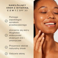 Modelka o promiennej cerze uśmiecha się obok listy zalet produktu na delikatnym złotym tle. Tekst podkreśla zalety kremu nawilżającego 2 w 1 z witaminą C i filtrem SPF 30:
Zapobiega oznakom przedwczesnego starzenia się skóry
Wzmacnia blask skóry
Nawilża cerę
100% użytkowników zgadza się, że ich skóra czuje się chroniona przez cały dzień